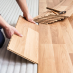What is cheaper laminate or vinyl flooring, and how can we make it?